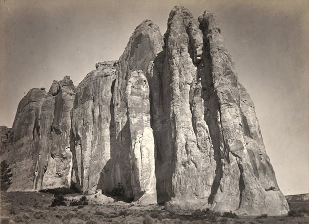 The south side of Inscription Rock (now El Morro National Monument), in New Mexico. Taken in 1873