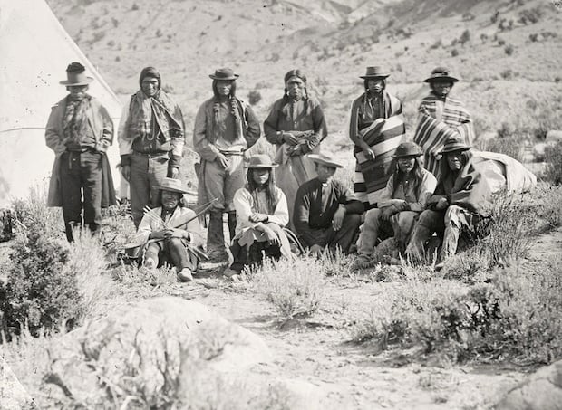 Pah-Ute (Paiute) Indian group, near Cedar, Utah. Taken in 1872.