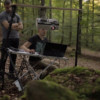 Projector Brought Into the Forest Turns Nature Into a Glowing Wonderland