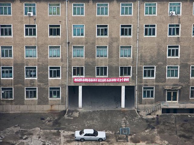 Pyongyang is supposed to look grand and modern in photos, so photographing run-down buildings is a big no-no.