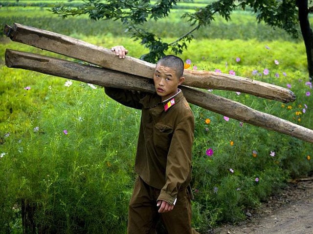 An unflattering photo of a North Korean soldier doing "menial tasks."