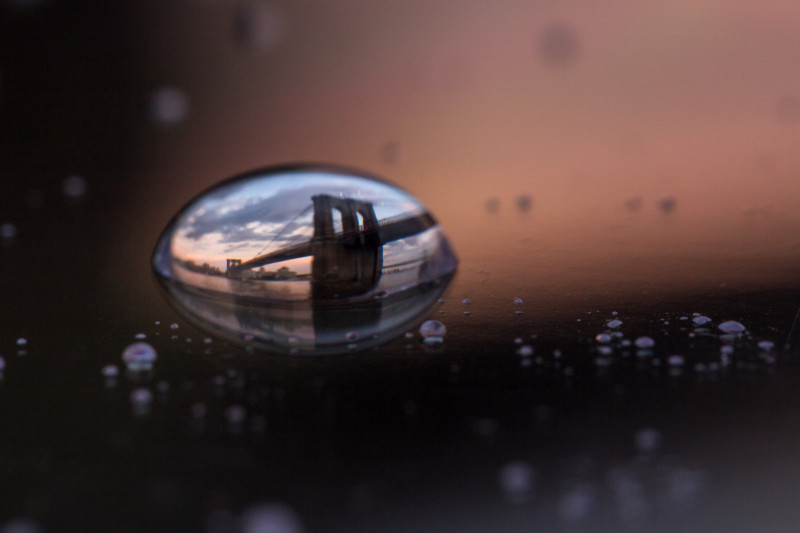  macro photographs cityscapes landmarks reflected water drops 