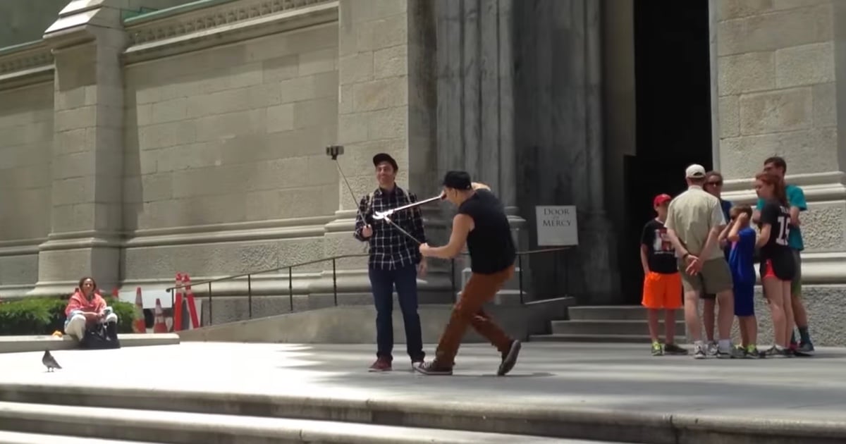  jerk destroys people selfie sticks with branch cutter 