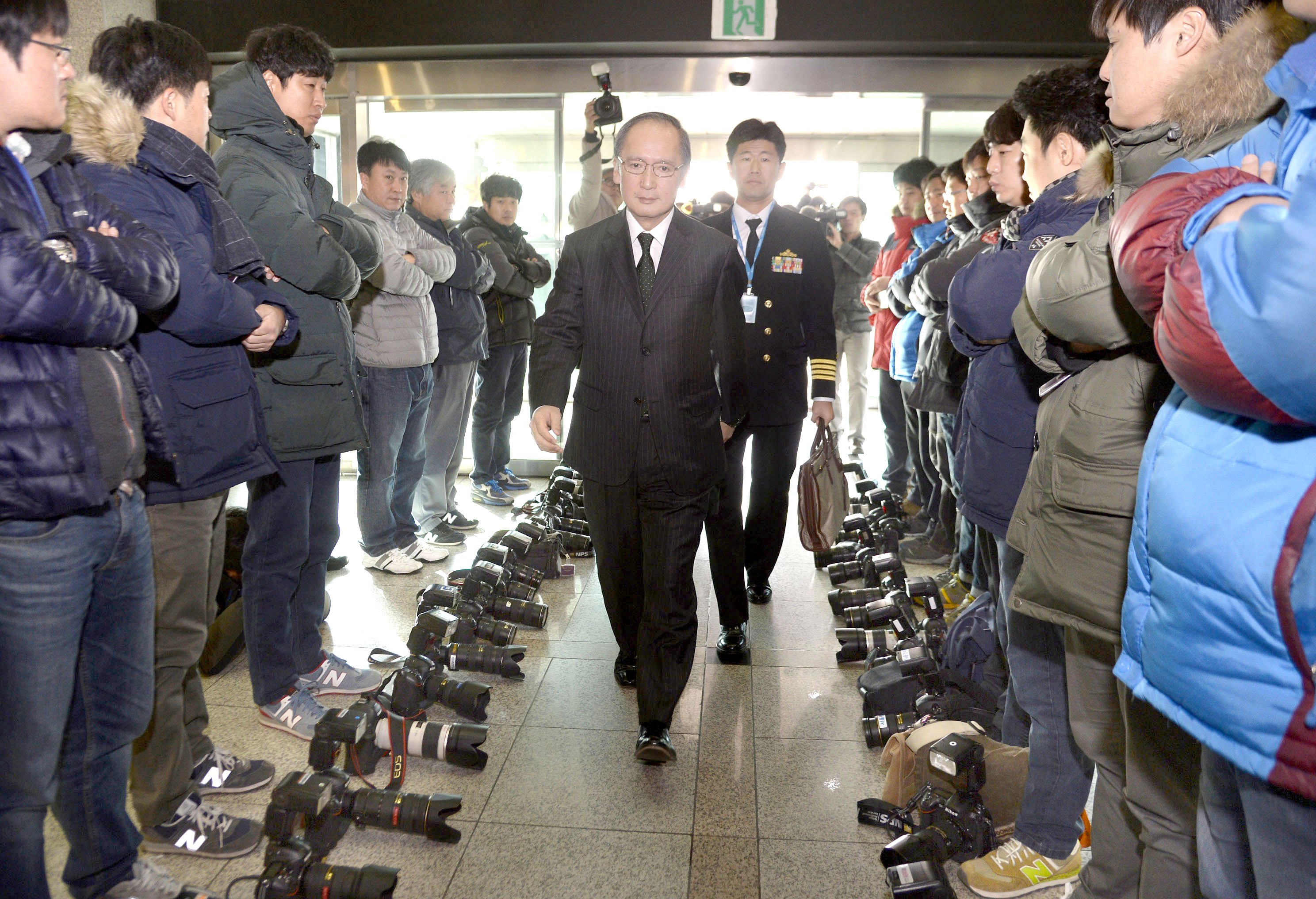  photojournalists lay down their dslrs protest south korea 