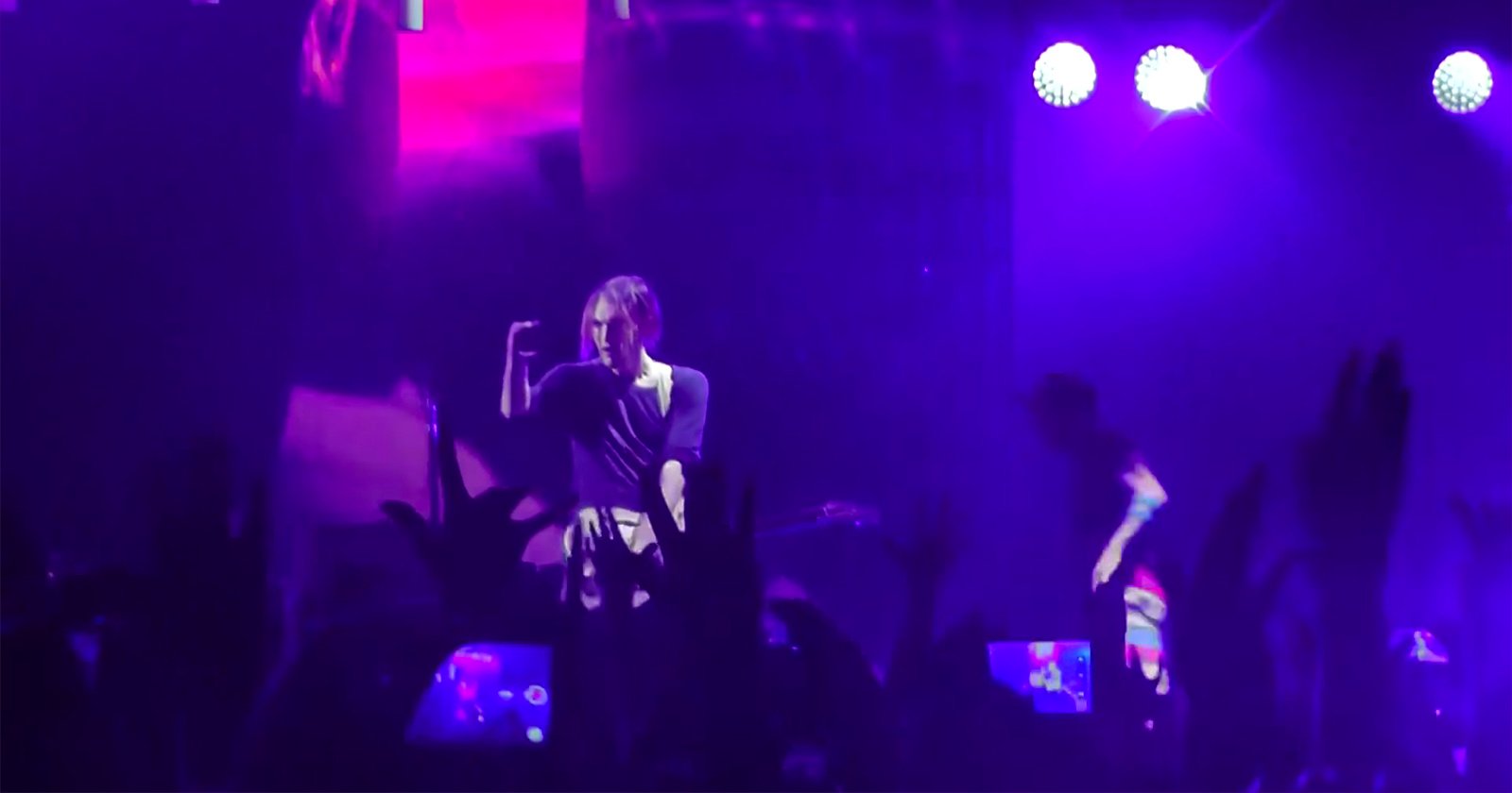 Annoyed Musician Shoots Audience with Phone Instead of Playing His Solo