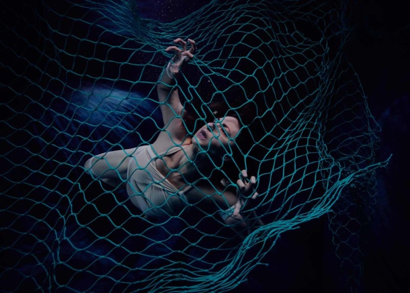 Underwater Photos of Woman in a Net Show the Horrors of Ghost Fishing