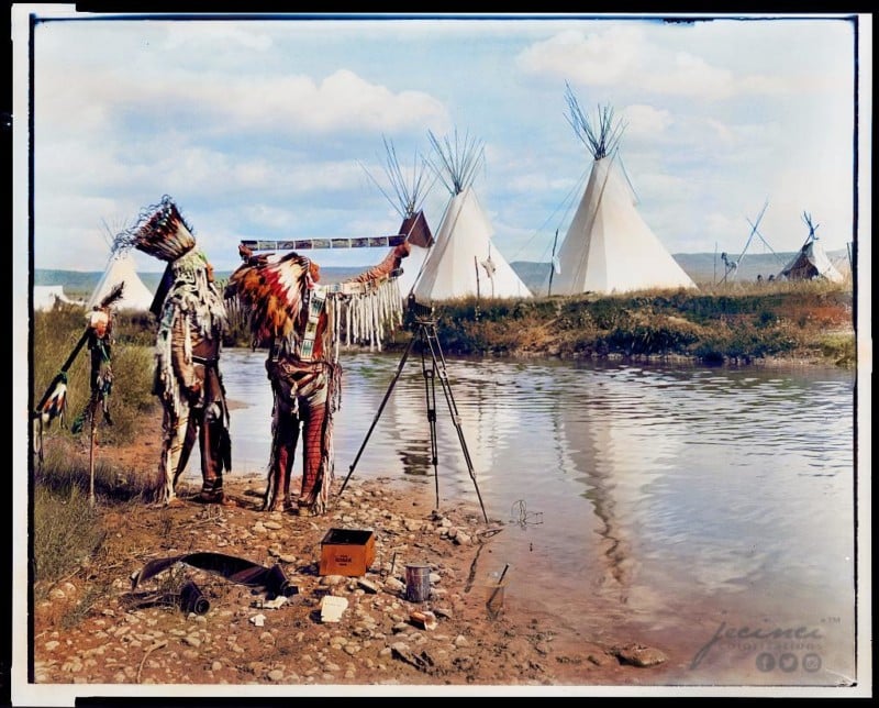 A Colorized Photo of Native Americans Looking at Camera Film in 1913