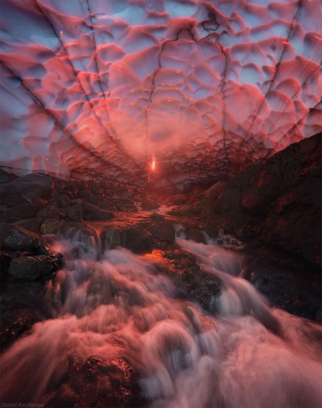 photo shows ice cave being lit flare 