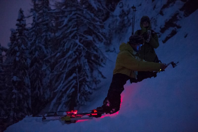 Night Skiing Lit by Flares on Drones
