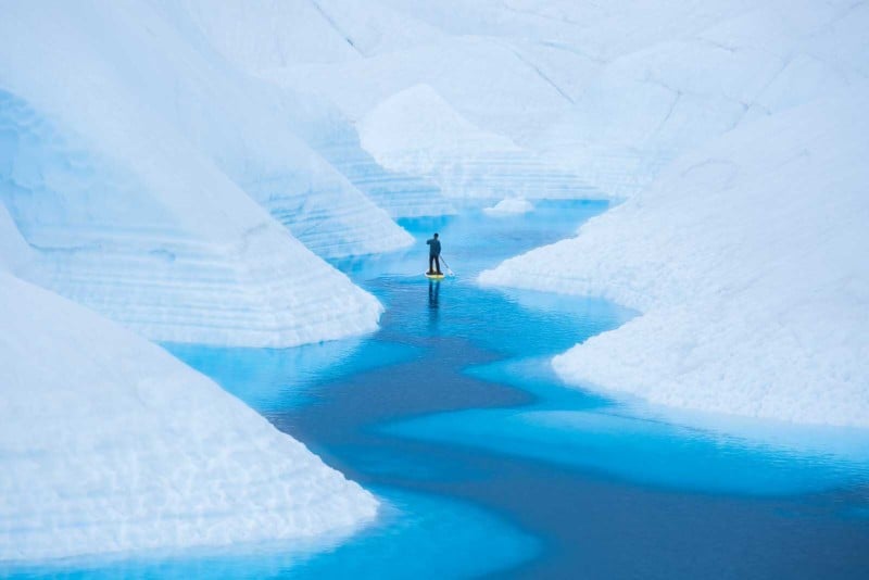 Photos of a Paddleboarder Gliding Through Alaskan Glaciers