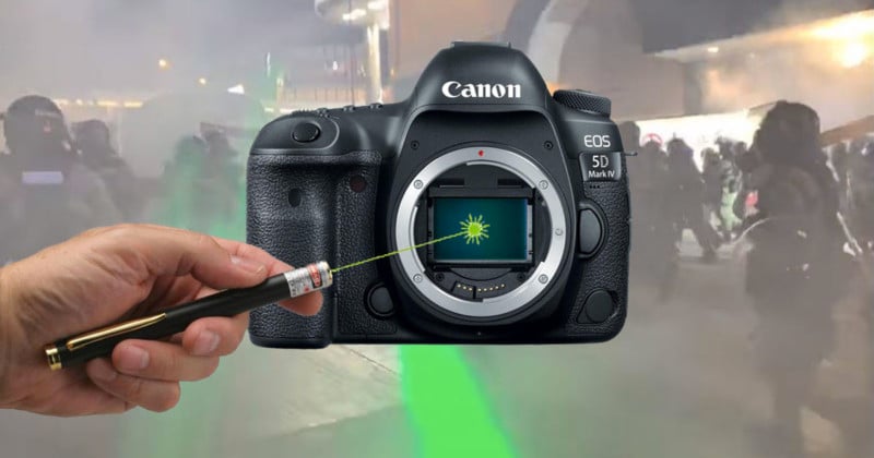  hong kong protester lasers are frying photographers cameras 
