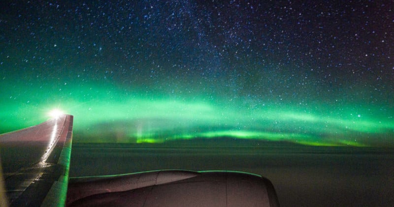 shooting aurora out airplane window 