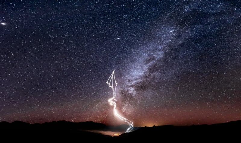 Photographer Captures Pyro Skydivers in a Milky Way Photo