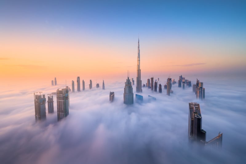  photographer captures skyscrapers dubai rising above clouds 