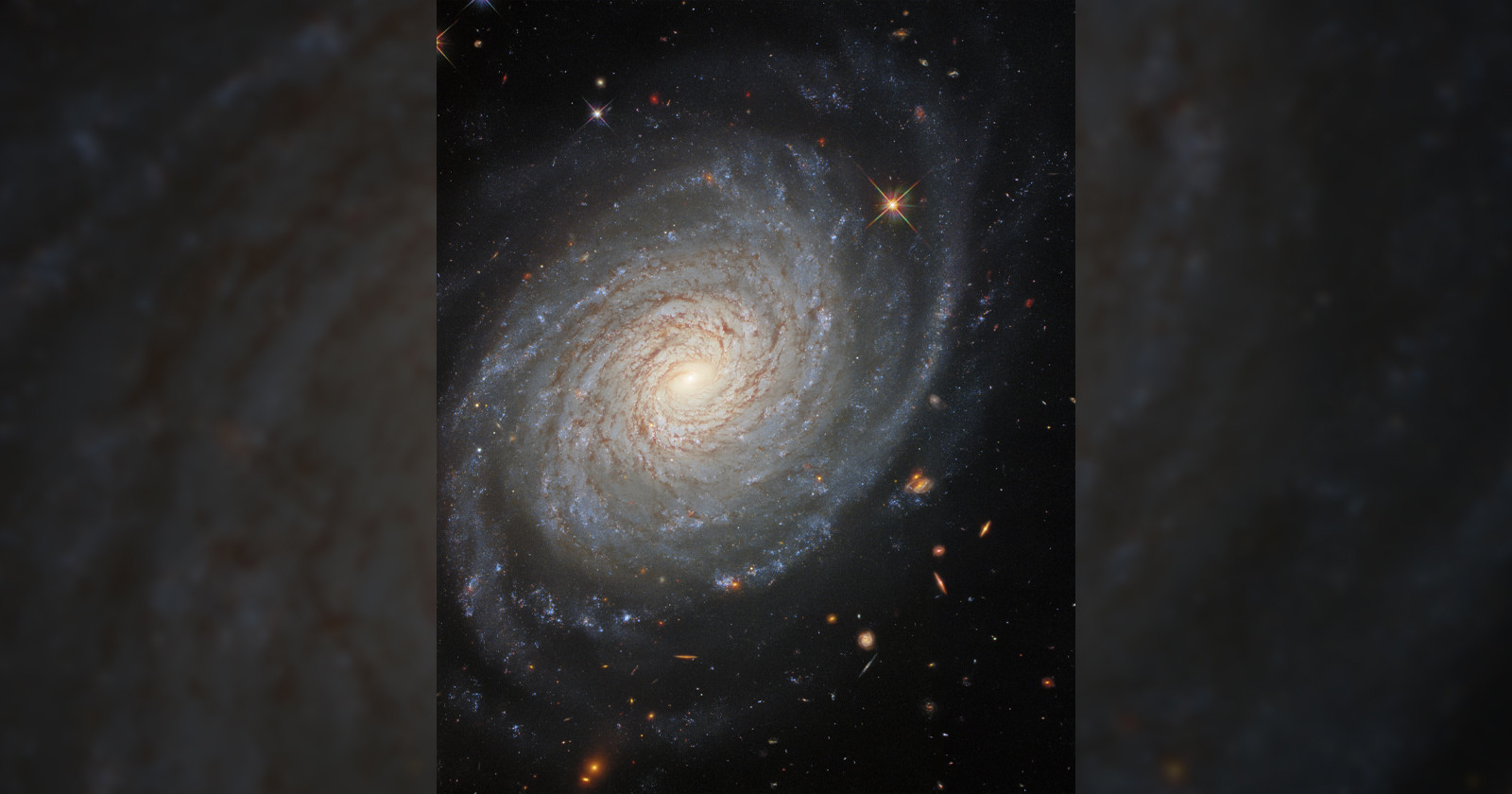  hubble captures majestic photo galaxy explosive past 