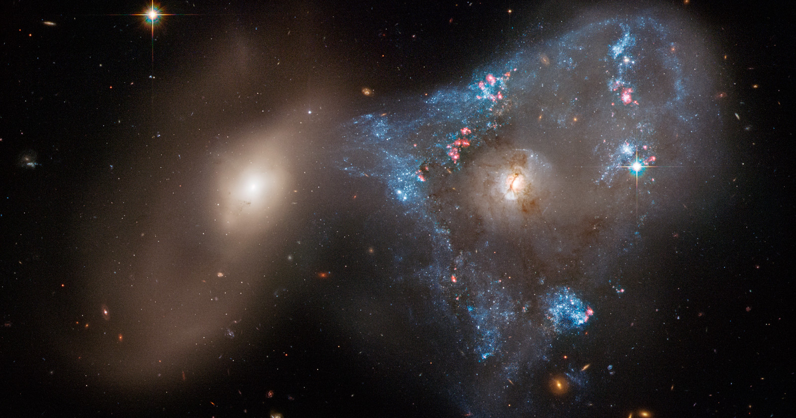 Hubble Captures Space Triangle Created by Colliding Galaxies