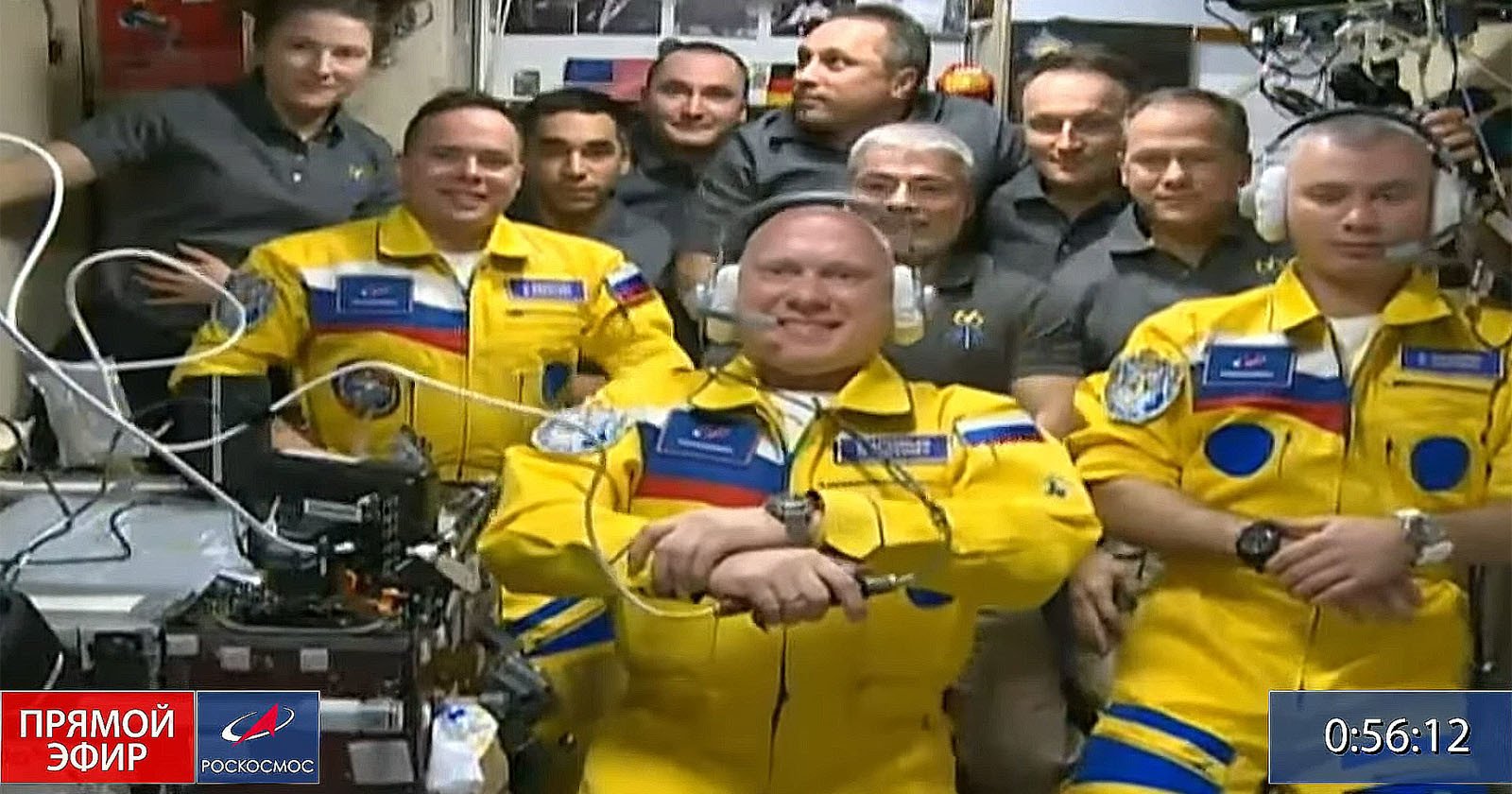  russian cosmonauts arrive iss colors ukrainian flag 