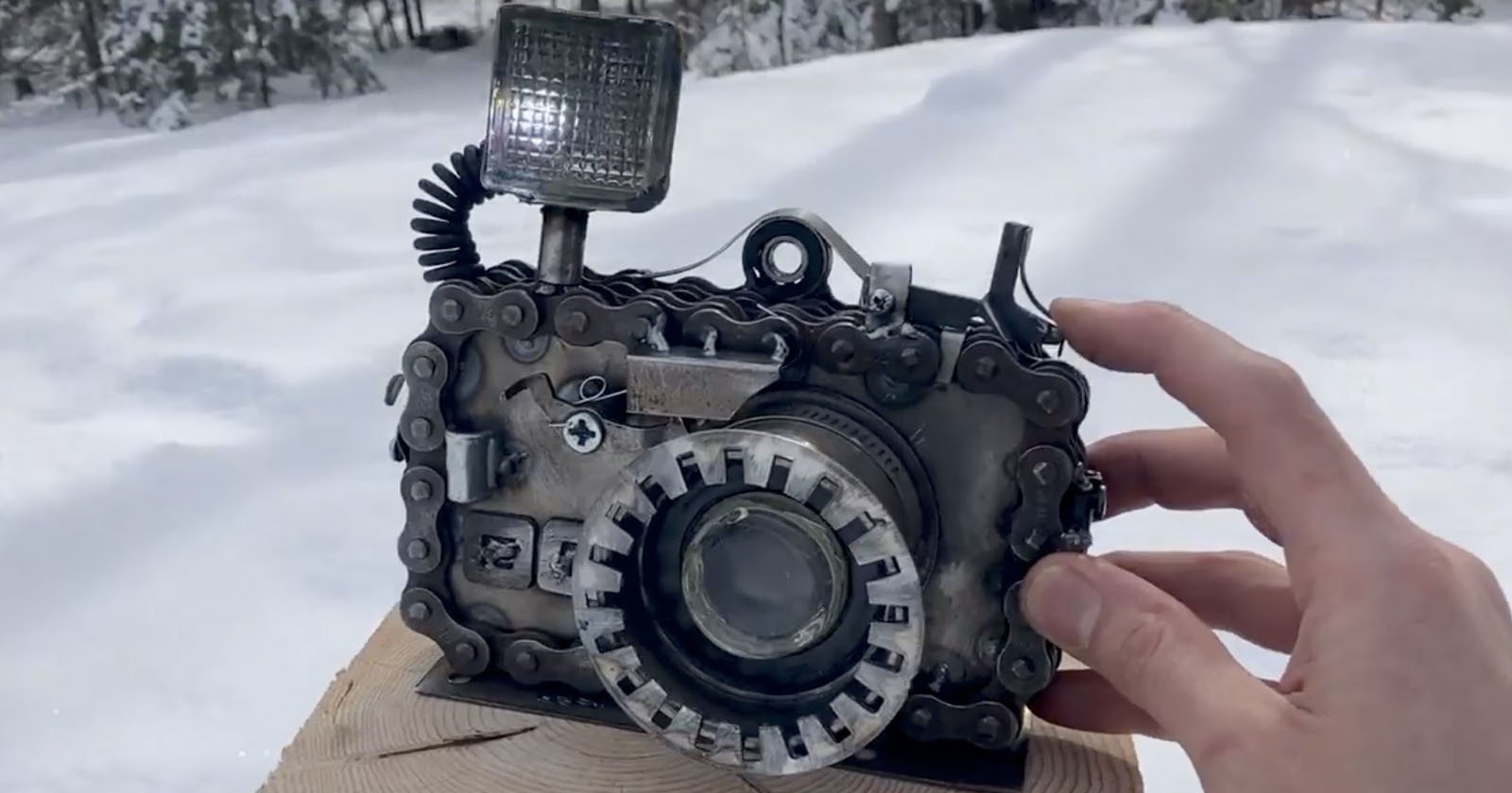 Artist Builds a Scrap Metal Camera with Working Flash and Shutter Button
