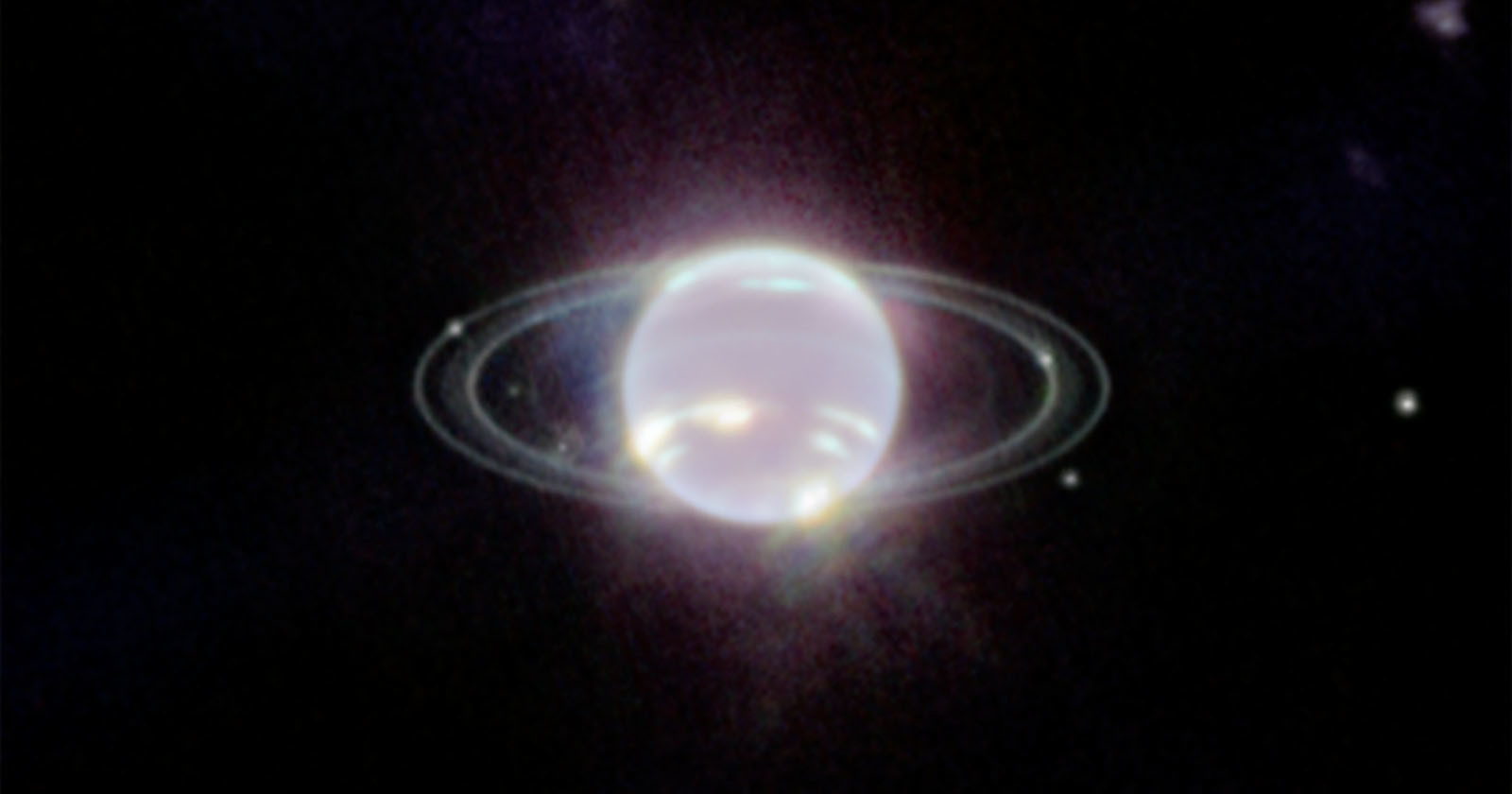 James Webb Telescope Captures Clear Photo of Neptunes Rings and Moons