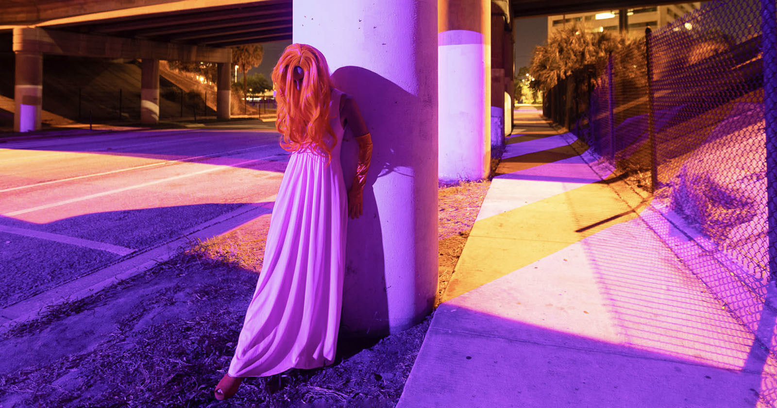 photographer uses broken streetlights shine purple 