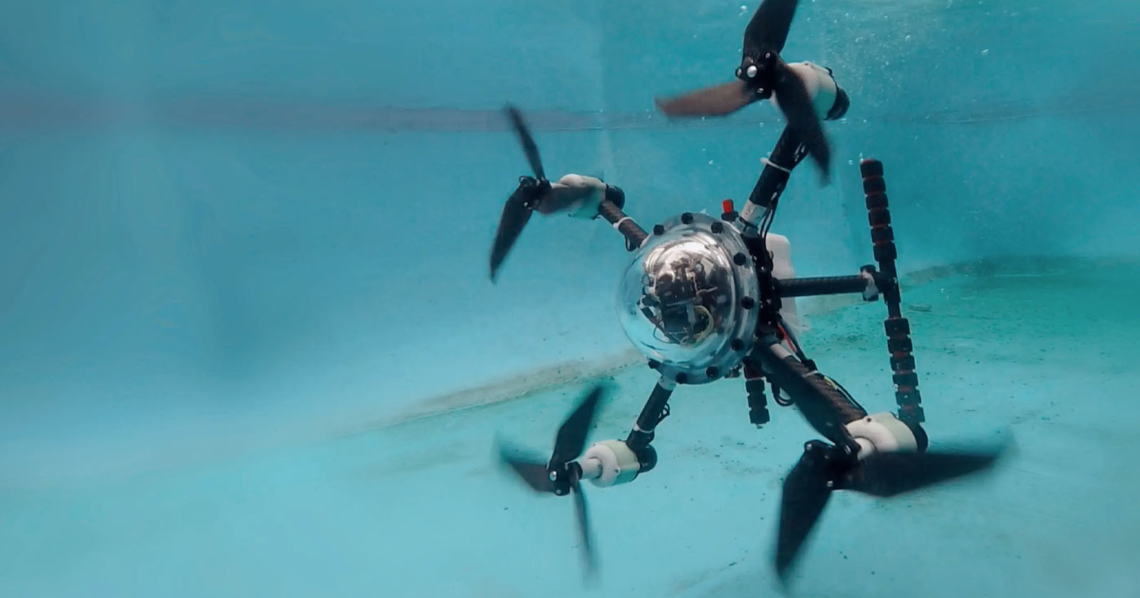 New Experimental Drone Can Fly Through the Air and Dive Underwater