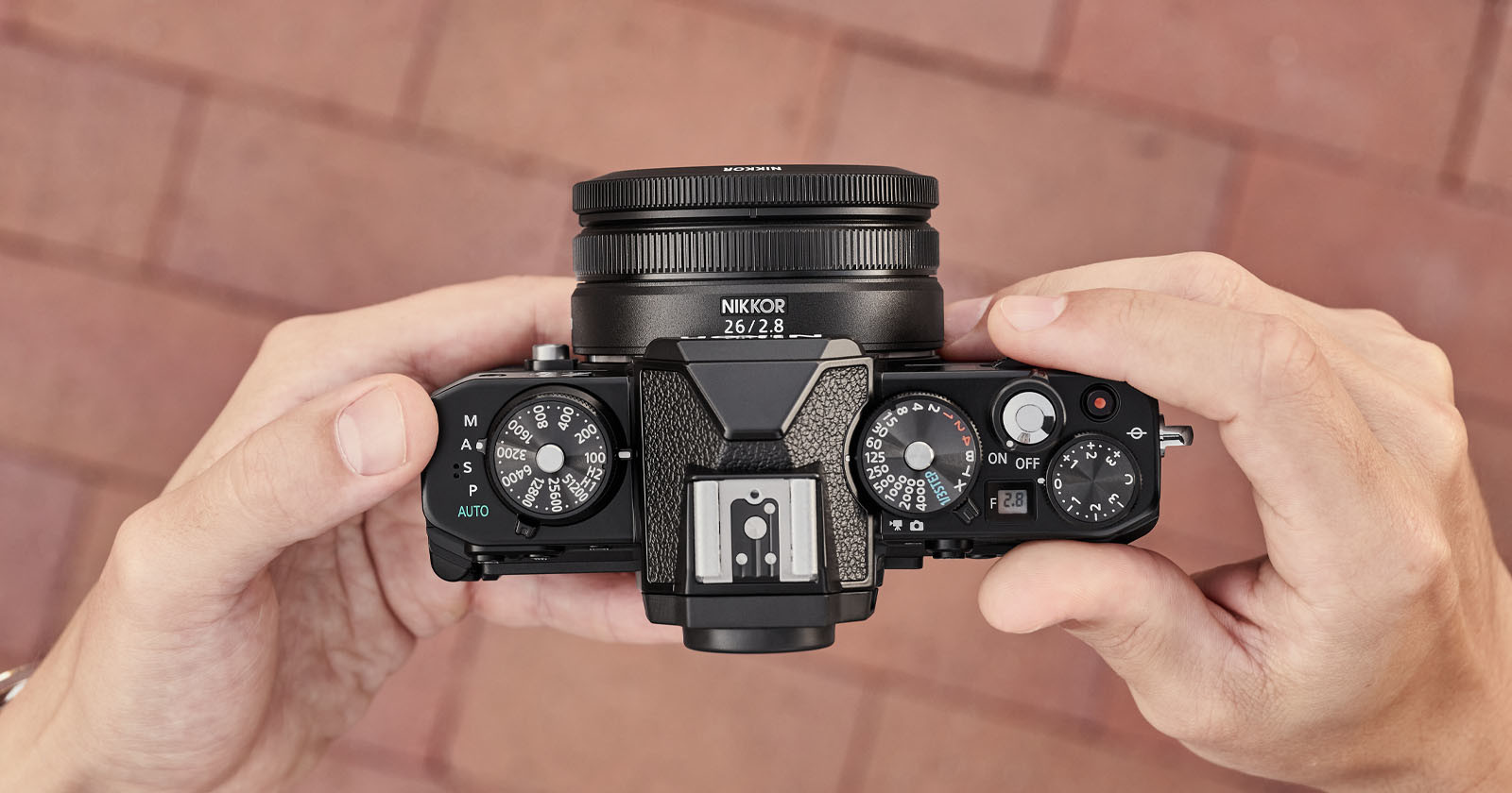  nikon 26mm its thinnest lightest full-frame lens 