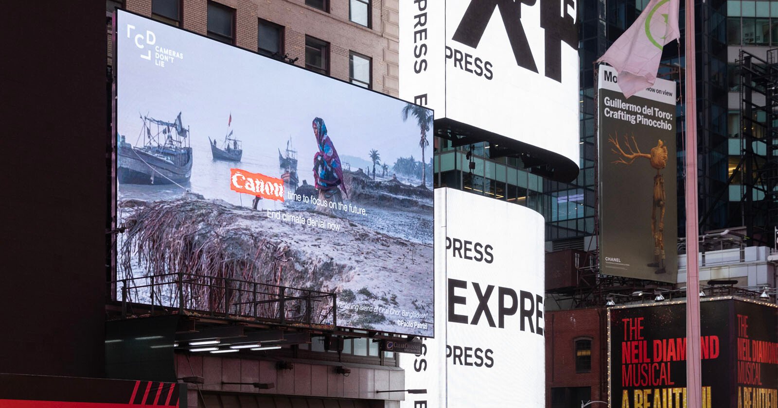 Canon Called Out for Climate Denial on a Billboard in New Yorks Times Square