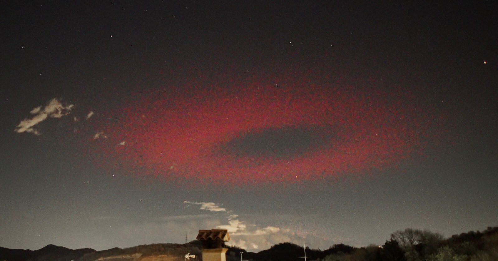 Photographer Captures Ultra-Rare Red Ring of Light Over Italy