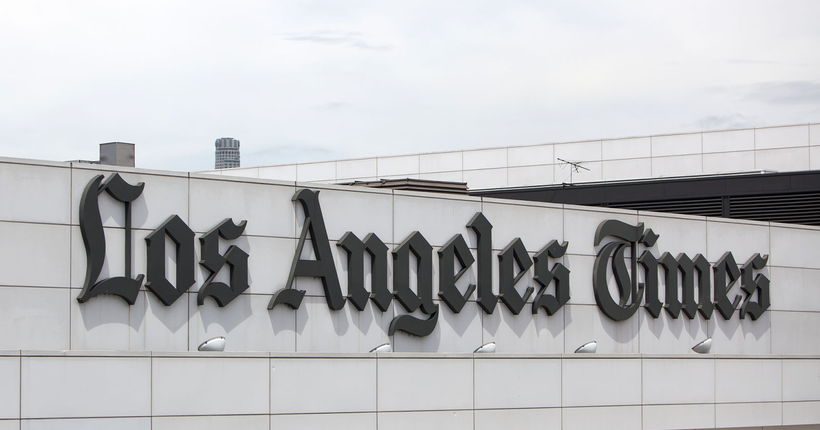  times cuts newsroom positions including several photographers 