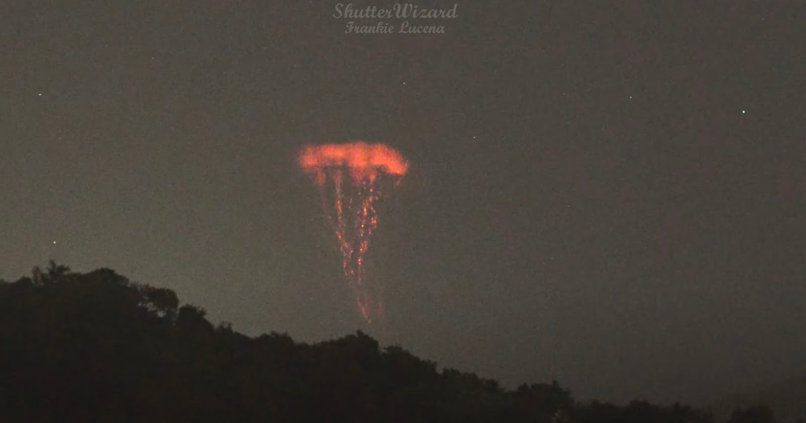 Photographer Captures Gigantic Jets of Lightning Shooting Above Tropical Storm