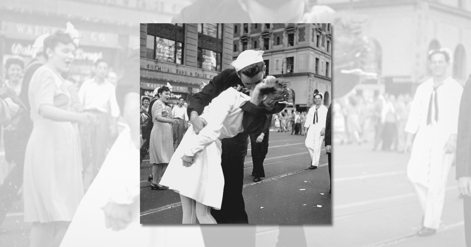  backtracks plan ban iconic v-day kiss photo from 