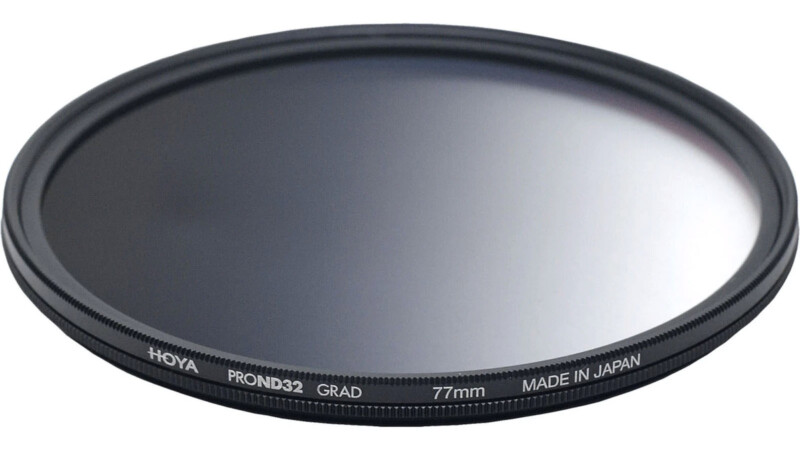 A circular graduated neutral density filter sits on a white background.