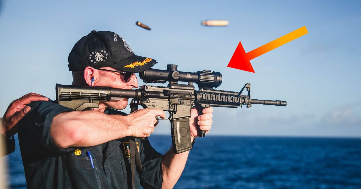 US Navy Mocked for Photo of Commander Shooting Rifle with Scope Backwards
