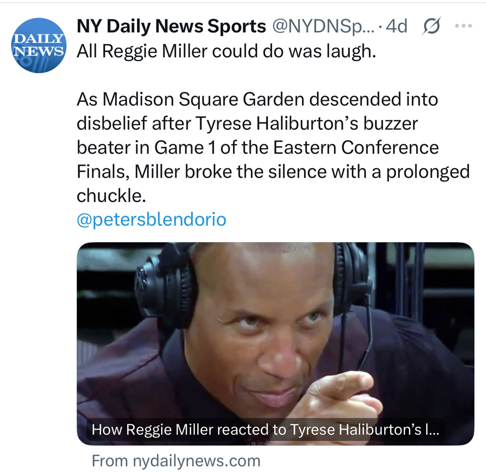 Reggie Miller wears a headset and points while smiling during a sports broadcast. The caption discusses his reaction to Tyrese Haliburton’s buzzer beater in the Eastern Conference Finals at Madison Square Garden.