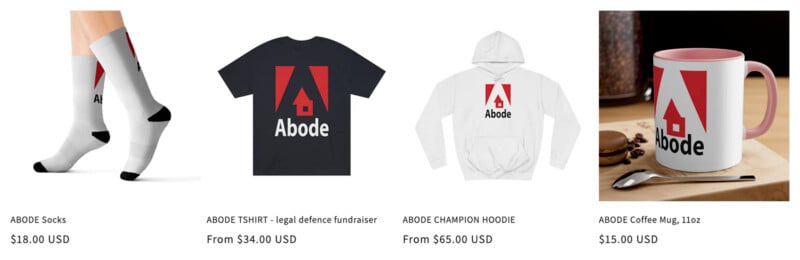 Four products with a red "Abode" house logo: white socks ($18), black T-shirt ($34+), white hoodie ($65+), and white coffee mug with pink handle and interior ($15), all displayed side by side.