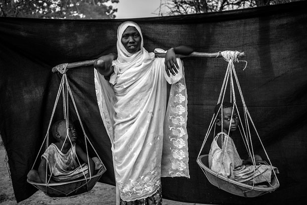 The most important object Dowla was able to bring with her is the wooden pole balanced over her shoulder, with which she carried her six children during the 10-day journey from Gabanit to South Sudan. At times, the children were too tired to walk, forcing her to carry two on either side.