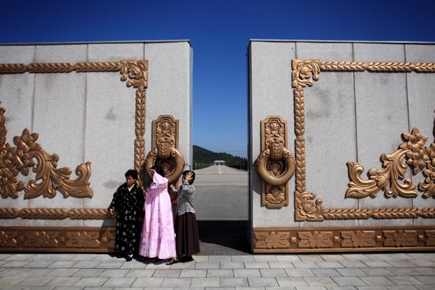 Visitors to the mausoleum of Kim il-Sung (known as the Kumsusan) in north-east Pyongyang. 2009