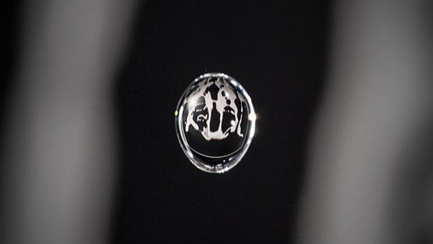 One of the team's early test photos showing an image reflected in a water drop