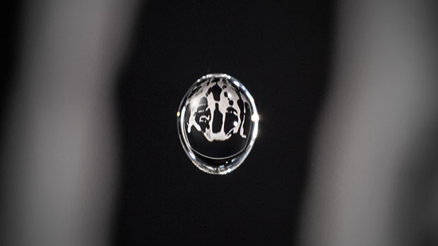 One of the team's early test photos showing an image reflected in a water drop