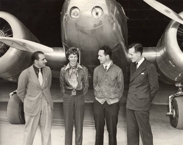 Earhart and her crew on March 17, 1937 about to embark on an ultimately unsuccessful first attempt due to issues with the plane.