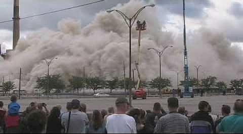 Freezeframe from video of Building 23 being demolished.