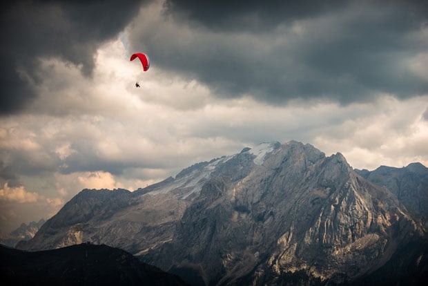 A paraglider in the sky of Val di Fassa, Trentino.