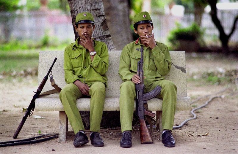 1988: Soldiers smoke in Cambodia