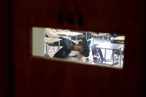 A student studies in a classroom as board members of the East Ramapo Central School District give Newsday for a tour of Ramapo Senior High School after complaints of vermin, mold and air quality issues were reported in the school district. (June 11, 2013)