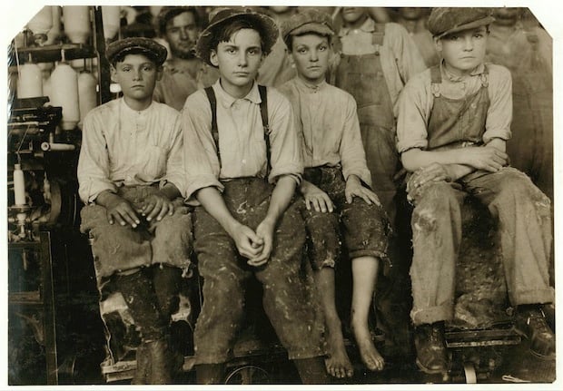 Some of the younger boys working in the Brazos Valley Cotton Mill at West. One, Charlie Lott was thirteen years old according to Family Record, another Norman Vaughn apparently twelve years old was under legal age according to one of the other boys there, Calvin Caughlin who did not appear to be fifteen years old himself. These and two girls that I proved to be under legal age were all working in this small mill. It was an exceptional case, but it it [i.e., is] likely that as the children become tired of school later in the year, there will be many more at work. Location: West, Texas.