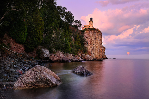 This was shot with a Nikon D3x and 24-70. In this situation, I needed to find a focus point that would keep both the rock in foreground sharp as well as the lighthouse (at my selected aperture). So, I found a spot on land that was just the right distance, focused, and released the AF-On button. From there, I composed the photo and shot away, never worrying about refocusing or recomposing. 