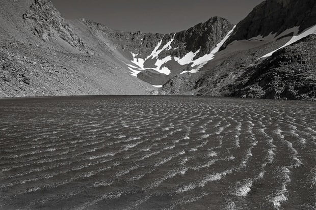 A strong summer wind makes whitecaps on Dana Lake.