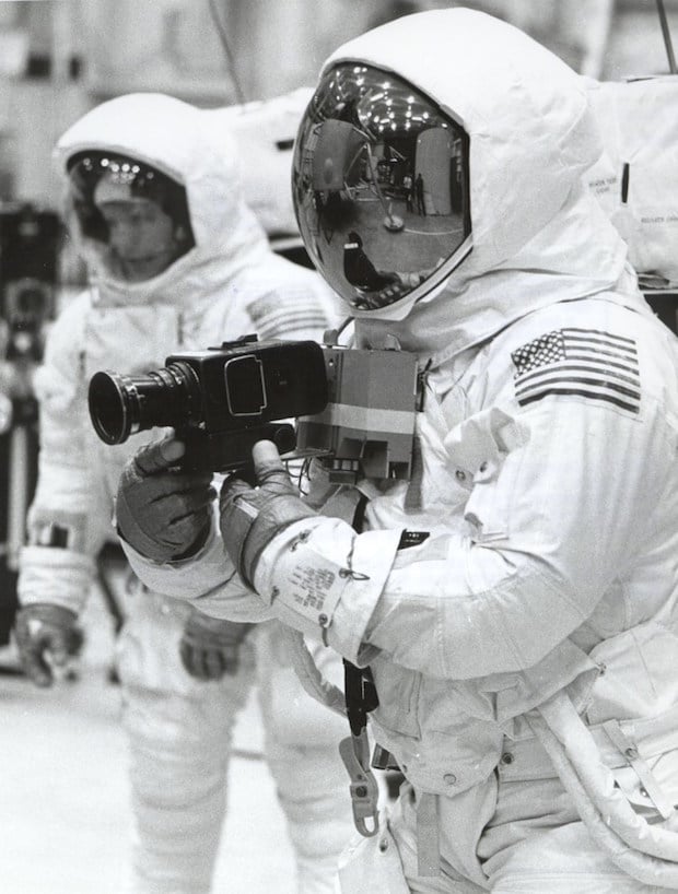Buzz Aldrin practices Hasselblad photography as Neil Armstrong looks on