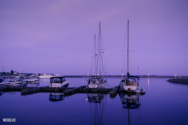Boats at Blue Hour. Taken with a 18-55mm kit lens. 