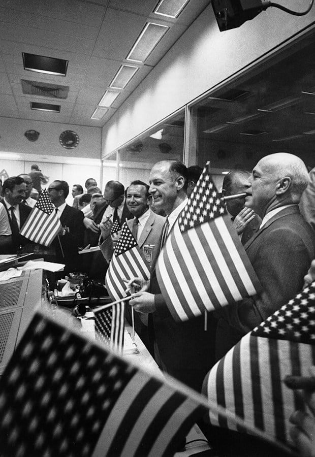 Mission control celebrates Apollo 11's safe return.